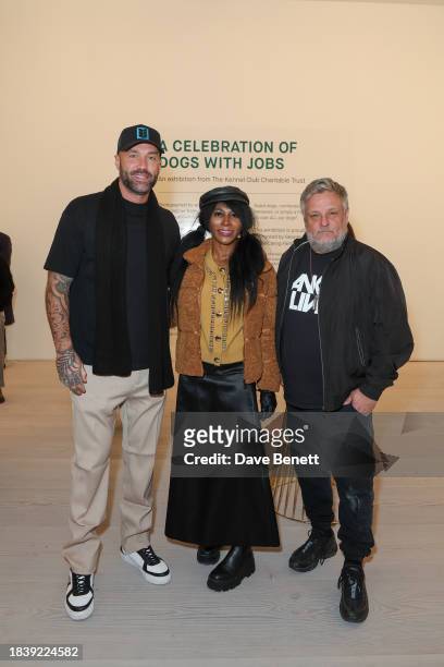 Calum Best, Sinitta and Rankin attend the exhibition opening preview of "Dogs with Jobs" by Rankin hosted by George, The Caring Family Foundation and...