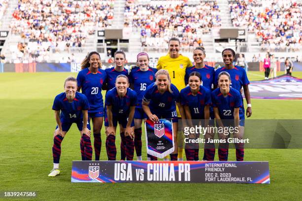 The United States pose for a team photo before the start of a match against China PR at DRV PNK Stadium on December 02, 2023 in Fort Lauderdale,...