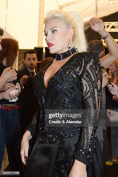 The singer Ajda Pekkan is seen backstage at the Raisa-Vanessa Sason show during Mercedes-Benz Fashion Week Istanbul s/s 2014 Presented By American...