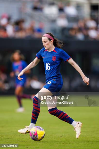 Rose Lavelle of the United States dribbles the ball during the first half of a match against China PR at DRV PNK Stadium on December 02, 2023 in Fort...