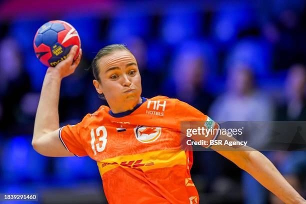 Yvette Broch of the Netherlands shoots to score during the 26th IHF Women's World Championship Handball Preliminary Round Group H match between...