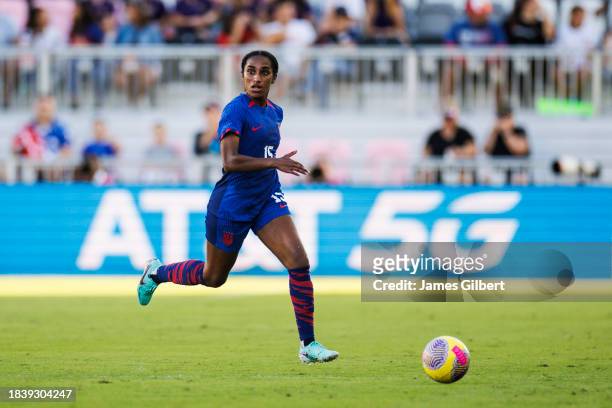 Naomi Girma of the United States dribbles the ball during the second half of a match against China PR at DRV PNK Stadium on December 02, 2023 in Fort...