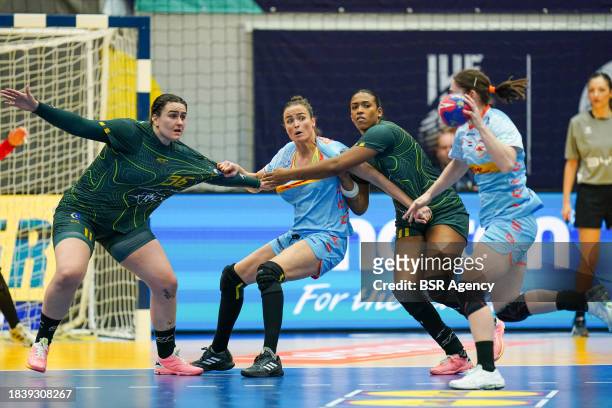 Yvette Broch of the Netherlands fightiing for position with Marcela Pivot Santos Arounian of Brazil, shot on goal by Lois Abbingh of The Netherlands...
