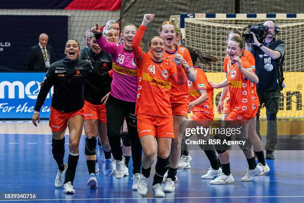 Players of The Netherlands celebrate the win during the 26th IHF Women's World Championship Handball Preliminary Round Group H match between...