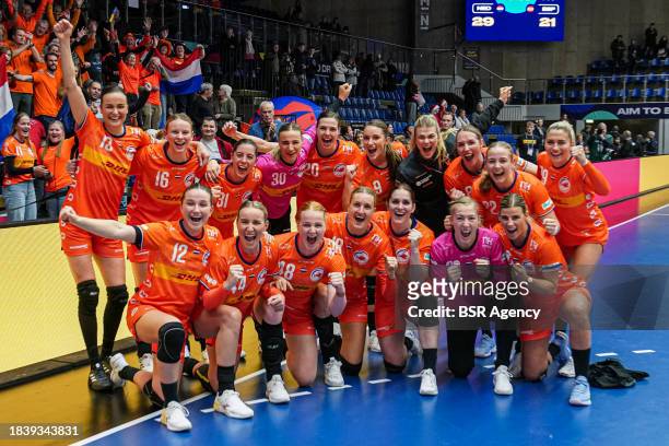 Players of The Netherlands celebrate the win and pose for a teamphoto during the 26th IHF Women's World Championship Handball Preliminary Round Group...