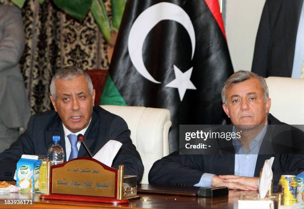 Libyan Prime Minister Ali Zeidan and head of the General National Congress Nouri Bousahmein give a press conference at the government headquarters in...