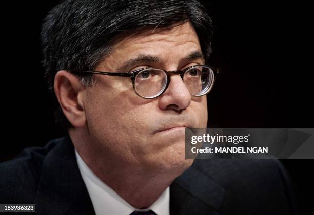 Treasury Secretary Jacob Lew testifies before the US Senate Finance Committee about the debt limit on October 10 on Capitol Hill in Washington, DC. A...