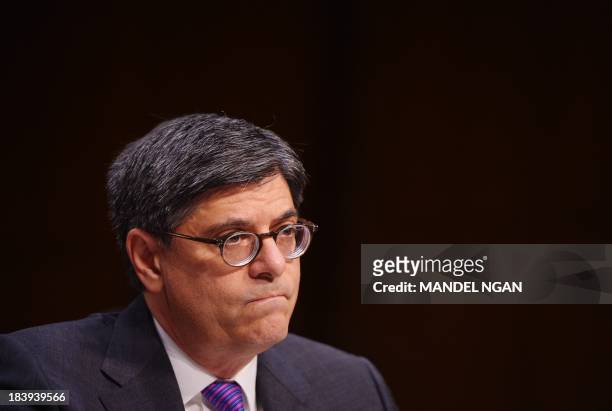 Treasury Secretary Jacob Lew testifies before the US Senate Finance Committee about the debt limit on October 10 on Capitol Hill in Washington, DC. A...