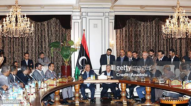 Libyan PM Ali Zeidan speaks during a press conference after he was released on October 10, Libya. Zeidan was kidnapped earlier today by unidentified...