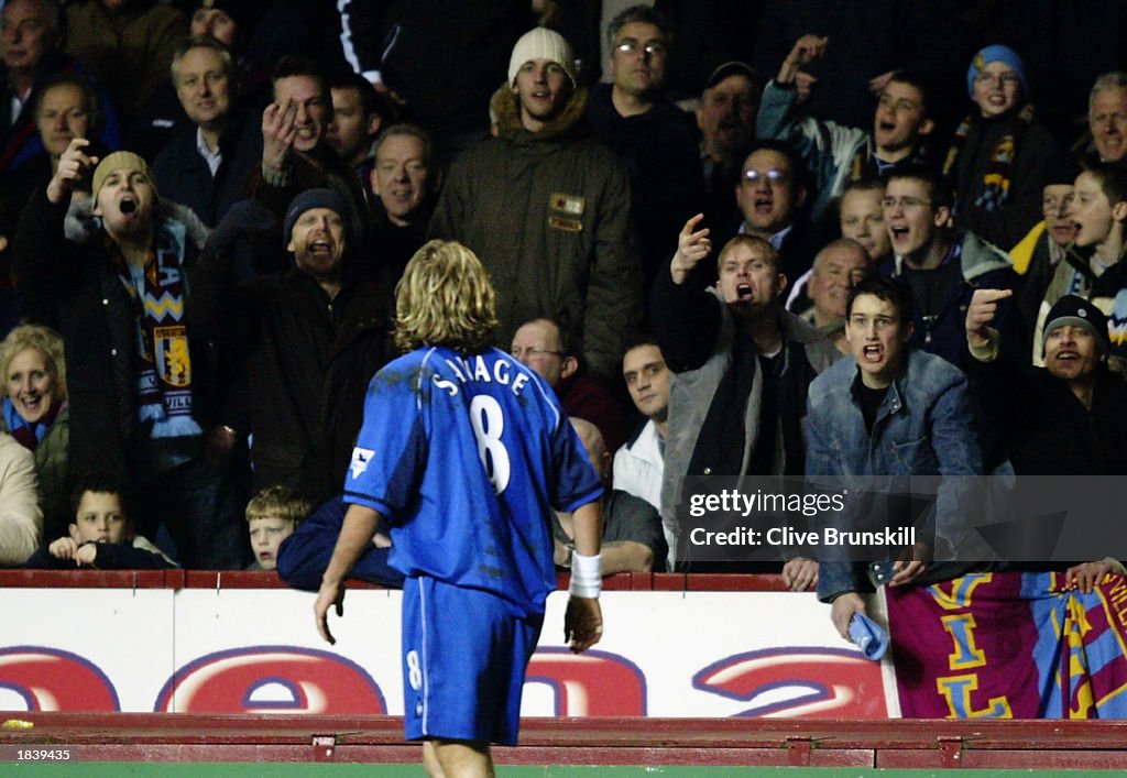 A popular Robbie Savage of Birmingham City is greeted by Aston Villa fans