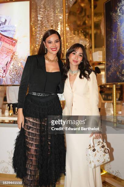Catriona Gray, Miss Universe 2018 and actress Heart Evangelista, are see during the Dior Carousel of Dreams Launch Event in Manila, on November 22,...