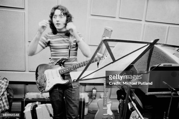 Irish singer and guitarist Rory Gallagher in a studio, July 1973.