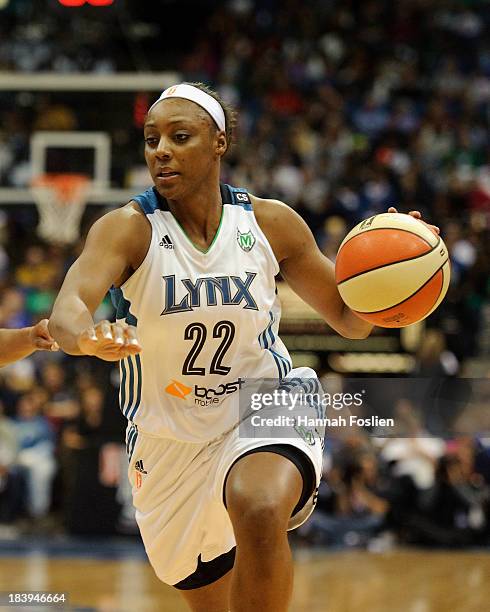 Monica Wright of the Minnesota Lynx dribbles the ball during Game One of the 2013 WNBA Finals against the Atlanta Dream on October 6, 2013 at Target...