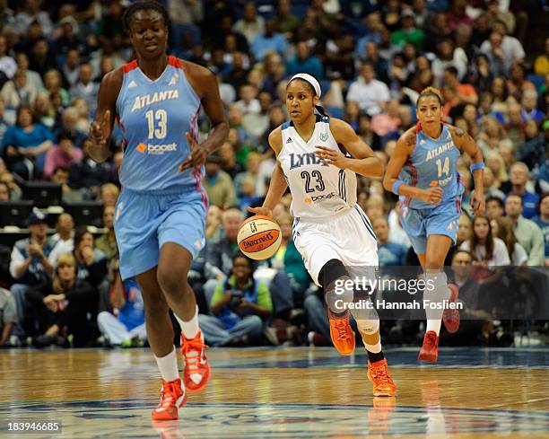 Maya Moore of the Minnesota Lynx dribbles the ball during Game One of the 2013 WNBA Finals against the Atlanta Dream on October 6, 2013 at Target...