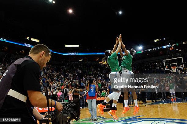 Maya Moore and Monica Wright of the Minnesota Lynx celebrate a win of Game One of the 2013 WNBA Finals against the Atlanta Dream on October 6, 2013...