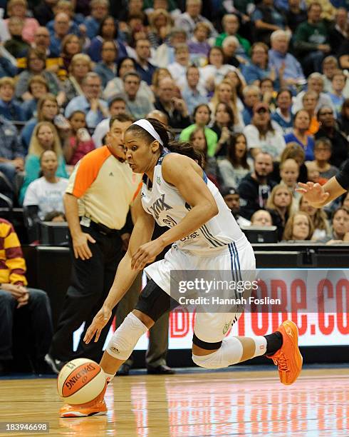 Maya Moore of the Minnesota Lynx drives to the basket during Game One of the 2013 WNBA Finals against the Atlanta Dream on October 6, 2013 at Target...