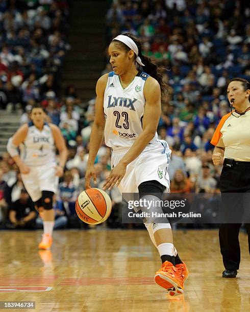 Maya Moore of the Minnesota Lynx dribbles the ball during Game One of the 2013 WNBA Finals against the Atlanta Dream on October 6, 2013 at Target...