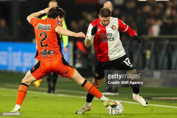 Luka Ivanusec of Feyenoord battles for the ball with Oskar Buur of FC Volendam during the Dutch Eredivisie match between Feyenoord and FC Volendam at...