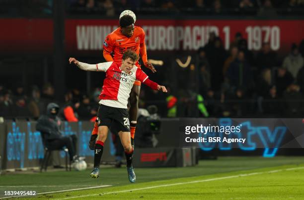 Lequincio Zeefuik of FC Volendam wins the headed ball of Mats Wieffer of Feyenoord during the Dutch Eredivisie match between Feyenoord and FC...