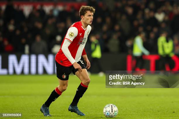 Mats Wieffer of Feyenoord runs with the ball during the Dutch Eredivisie match between Feyenoord and FC Volendam at Stadion Feijenoord on December 7,...