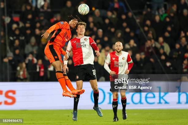 Mats Wieffer of Feyenoord wins the headed ball of Quincy Hoeve of FC Volendam during the Dutch Eredivisie match between Feyenoord and FC Volendam at...