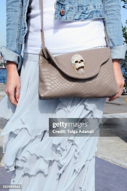 Semra Sen wears Three People skirt and a Home Store bag during Mercedes-Benz Fashion Week Istanbul s/s 2014 presented by American Express on October...