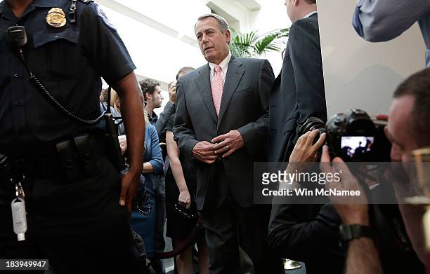 Speaker of the House John Boehner arrives for a press conference with members of the House Republican leadership at the U.S. Capitol following a...