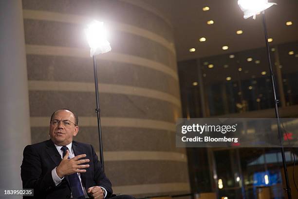 Axel Weber, chairman of UBS AG, speaks during a Bloomberg Television interview at the International Monetary Fund and World Bank Group Annual...
