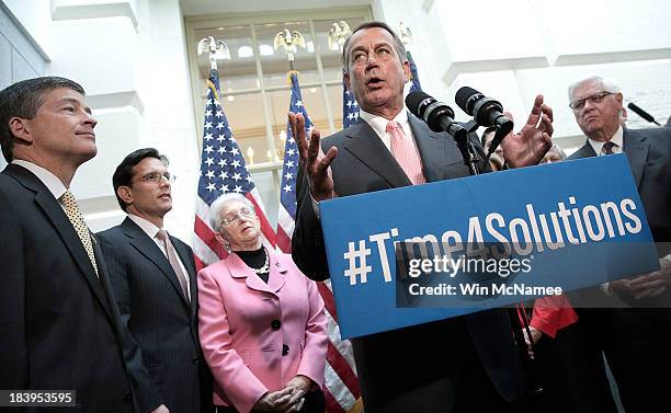 Speaker of the House John Boehner speaks during a press conference with members of the House Republican leadership at the U.S. Capitol following a...