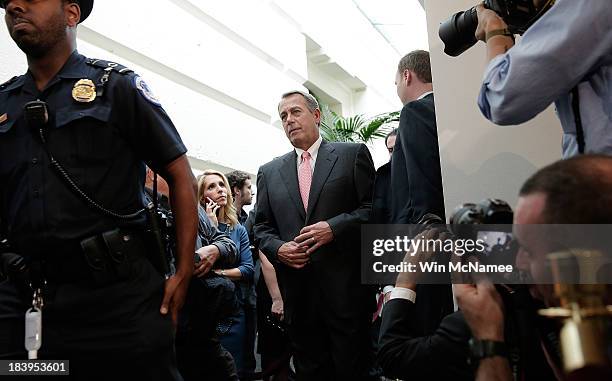 Speaker of the House John Boehner arrives for a press conference with members of the House Republican leadership at the U.S. Capitol following a...