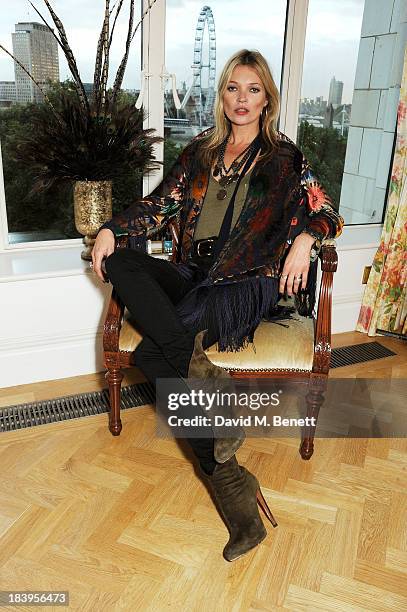 Kate Moss attends the Rimmel London 180 Years Of Cool photocall at The Savoy Hotel on October 10, 2013 in London, England.