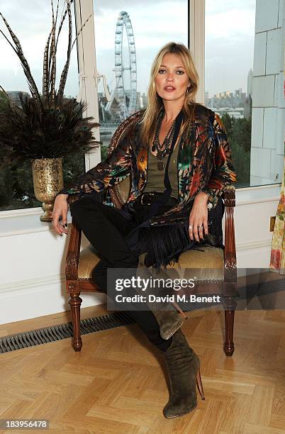 Kate Moss attends the Rimmel London 180 Years Of Cool photocall at The Savoy Hotel on October 10, 2013 in London, England.