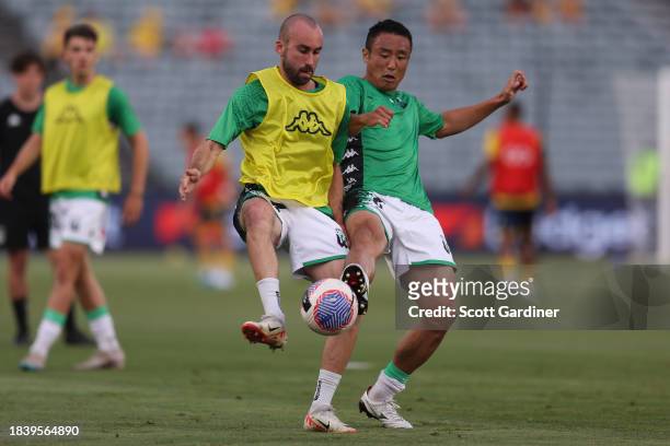Angus Thurgate and Tomoki Imai of Western United warming up prior to play during the A-League Men round seven match between Central Coast Mariners...