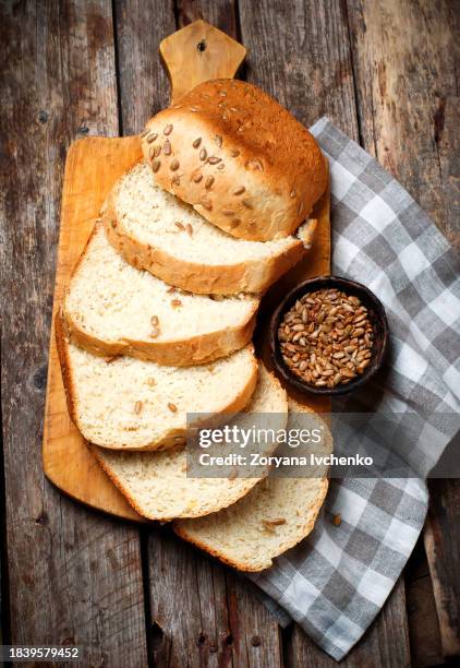 whole wheat sunflower honey oatmeal bread baked in the bread machine - bran stock pictures, royalty-free photos & images