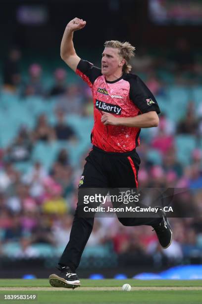 Will Sutherland of the Renegades celebrates after taking the wicket of Josh Philippe of the Sixers during the BBL match between Sydney Sixers and...