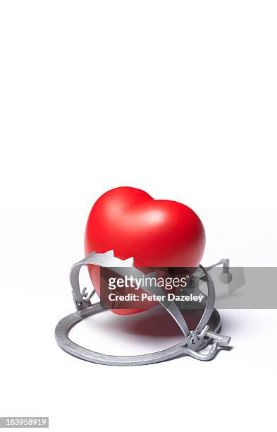 heart in trap - mousetrap stock pictures, royalty-free photos & images