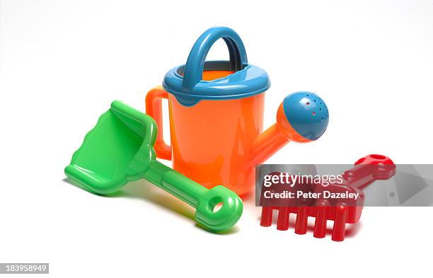 children's gardening and watering tools - gardening equipment white background stock pictures, royalty-free photos & images