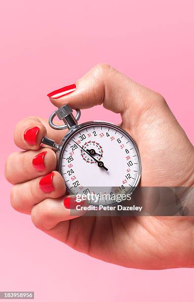 woman's biological watch ticking - chronomètre photos et images de collection