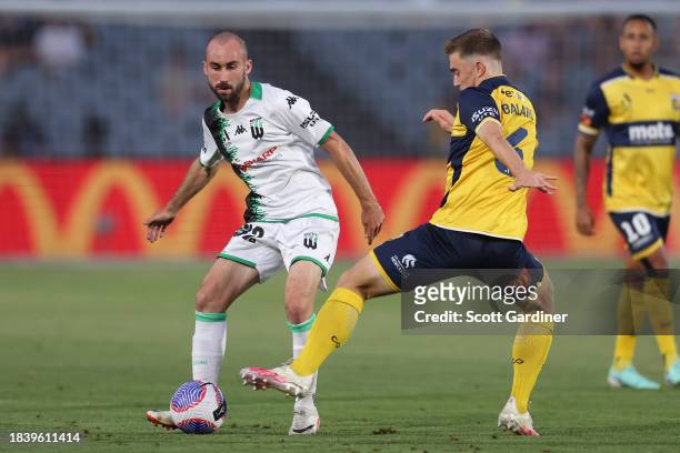 Angus Thurgate of Western United kicks the bladuring the A-League Men round seven match between Central Coast Mariners and Western United at...