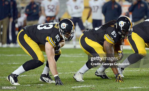 Tight ends Heath Miller and David Johnson of the Pittsburgh Steelers look on from the line of scrimmage during a game against the Chicago Bears at...