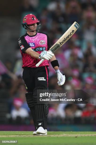 Steve Smith of the Sixers celebrates after reaching his half century during the BBL match between Sydney Sixers and Melbourne Renegades at Sydney...