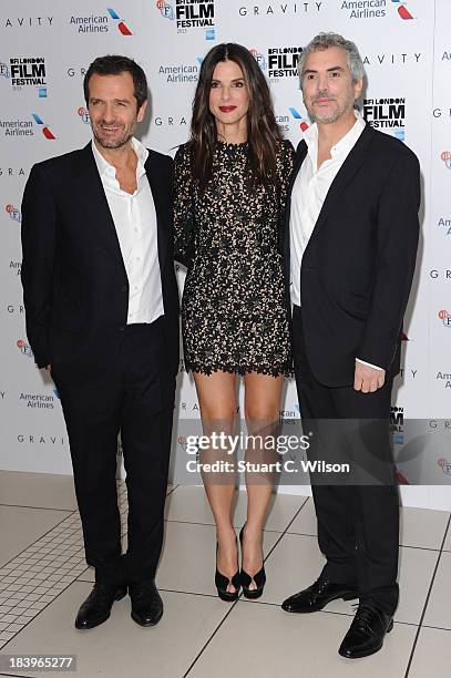 Producer David Heyman, actress Sandra Bullock and director Alfonso Cuaron attend a screening of "Gravity" during the 57th BFI London Film Festival at...