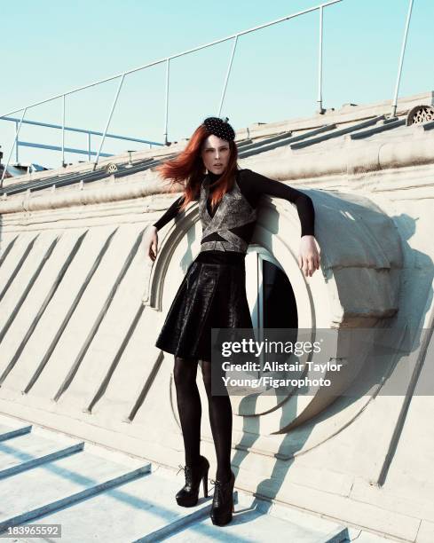 Model Coco Rocha poses at a fashion shoot for Madame Figaro on July 19, 2013 in Paris, France. Bra, skirt and body , hat . CREDIT MUST READ: Alistair...