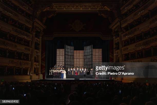 The cast of the opera "Don Carlo" during the final applauses at the 2023/2024 Season Inauguration at Teatro Alla Scala on December 07, 2023 in Milan,...