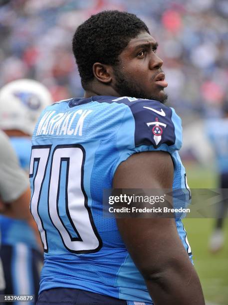 Chance Warmack of the Tennessee Titans watches from the sideline during a game against the Kansas City Chiefs at LP Field on October 6, 2013 in...