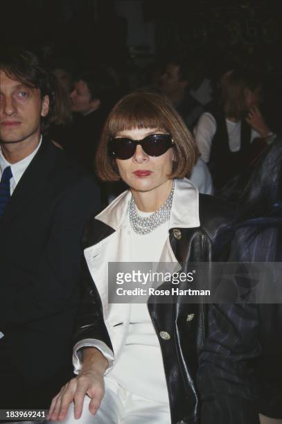 English editor-in-chief of American Vogue, Anna Wintour attends the Marc Jacobs Spring 1996 fashion show, 1995.