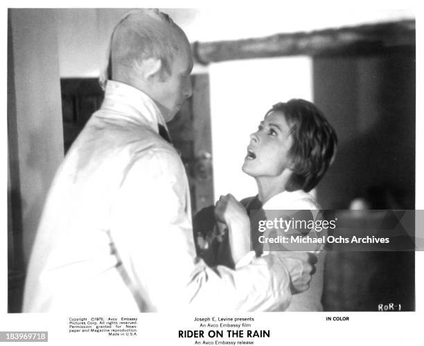 Actor Marc Mazza and actress Marlene Jobert on set of the Embassy Pictures movie "Rider on the Rain" in 1970.