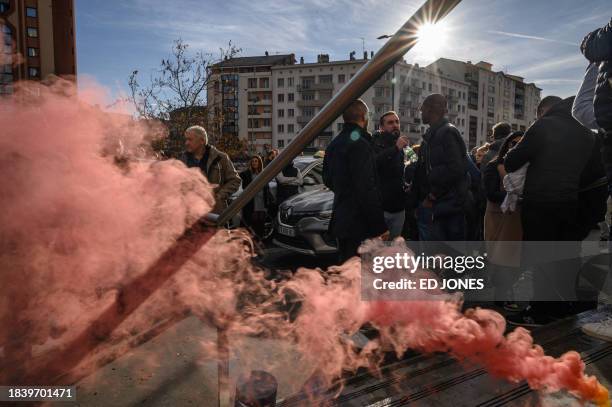 Taxi drivers gather outside the 'Caisse primaire d'assurance maladie' during a demonstration against health insurance project law of "patient...