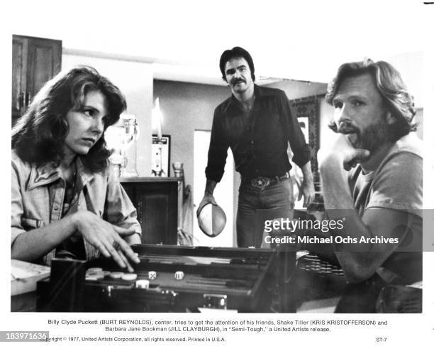 Actress Jill Clayburgh with actors Burt Reynolds and Kris Kristofferson on set for the United Artists movie " Semi-Tough" in 1977.