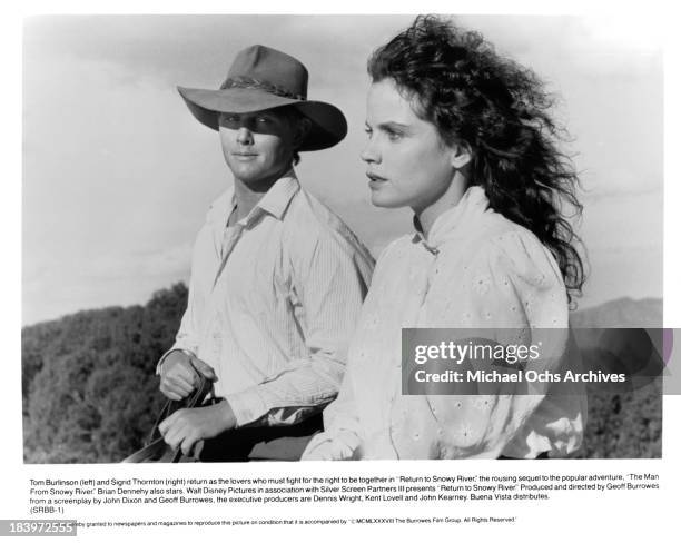 Actor Tom Burlinson and actress Sigrid Thornton on set of the movie "Return to Snowy River" in 1988.